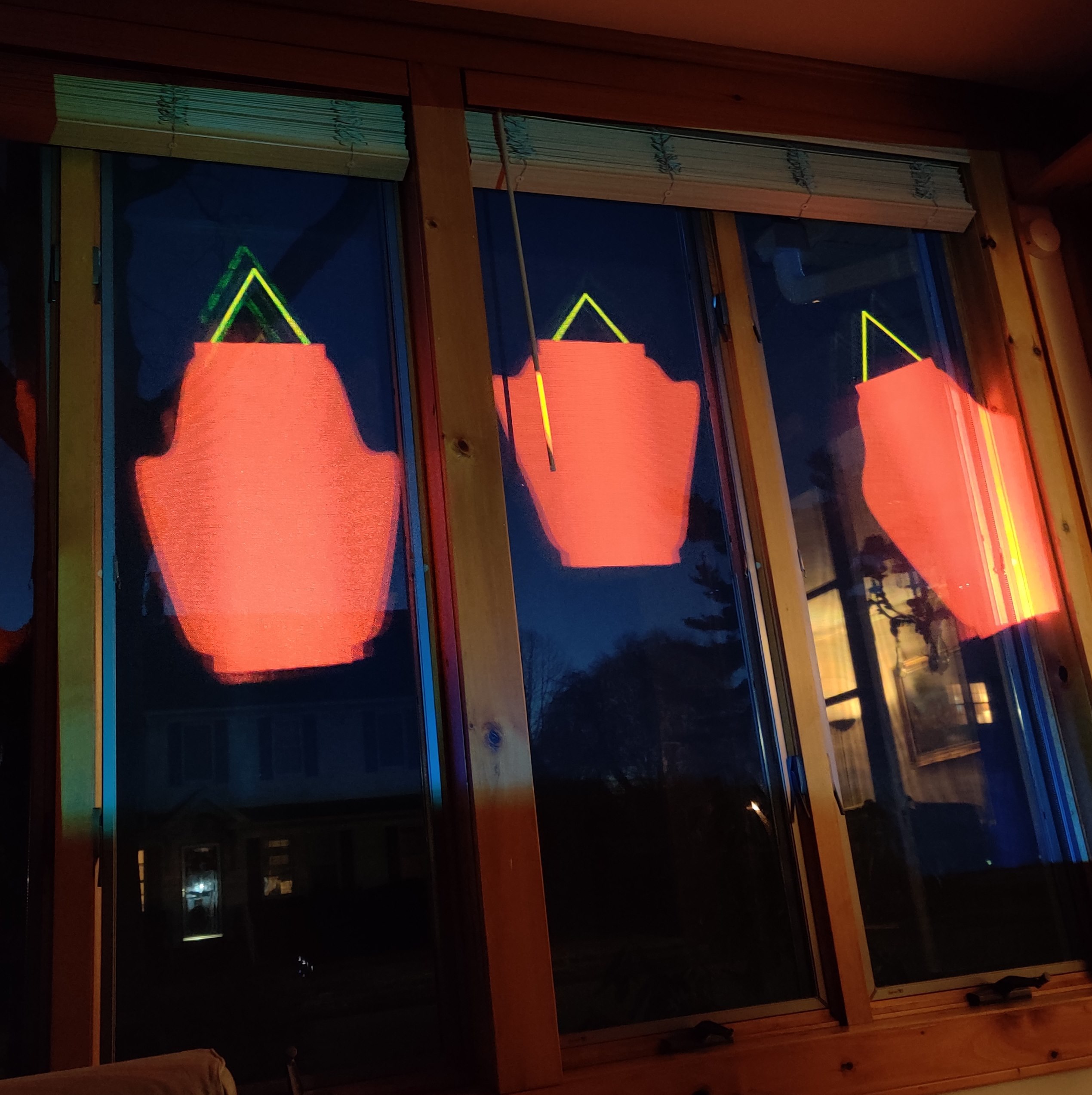 Photo of projected lanterns on window
